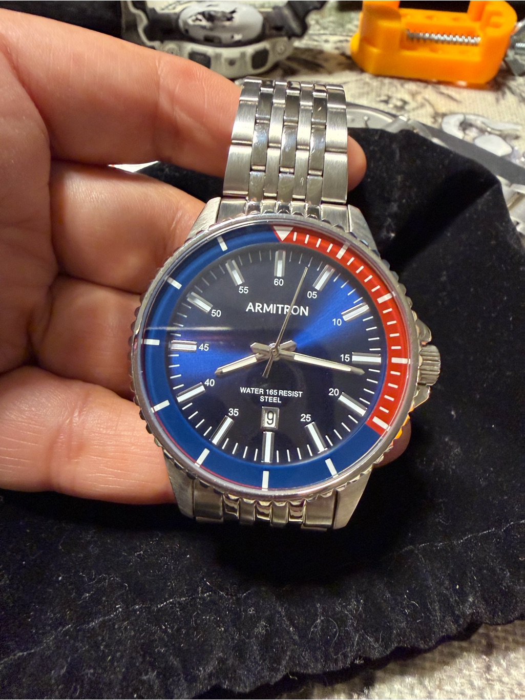 Armitron Silver Steel Watch With Blue Dial And Red  Blue Bezel